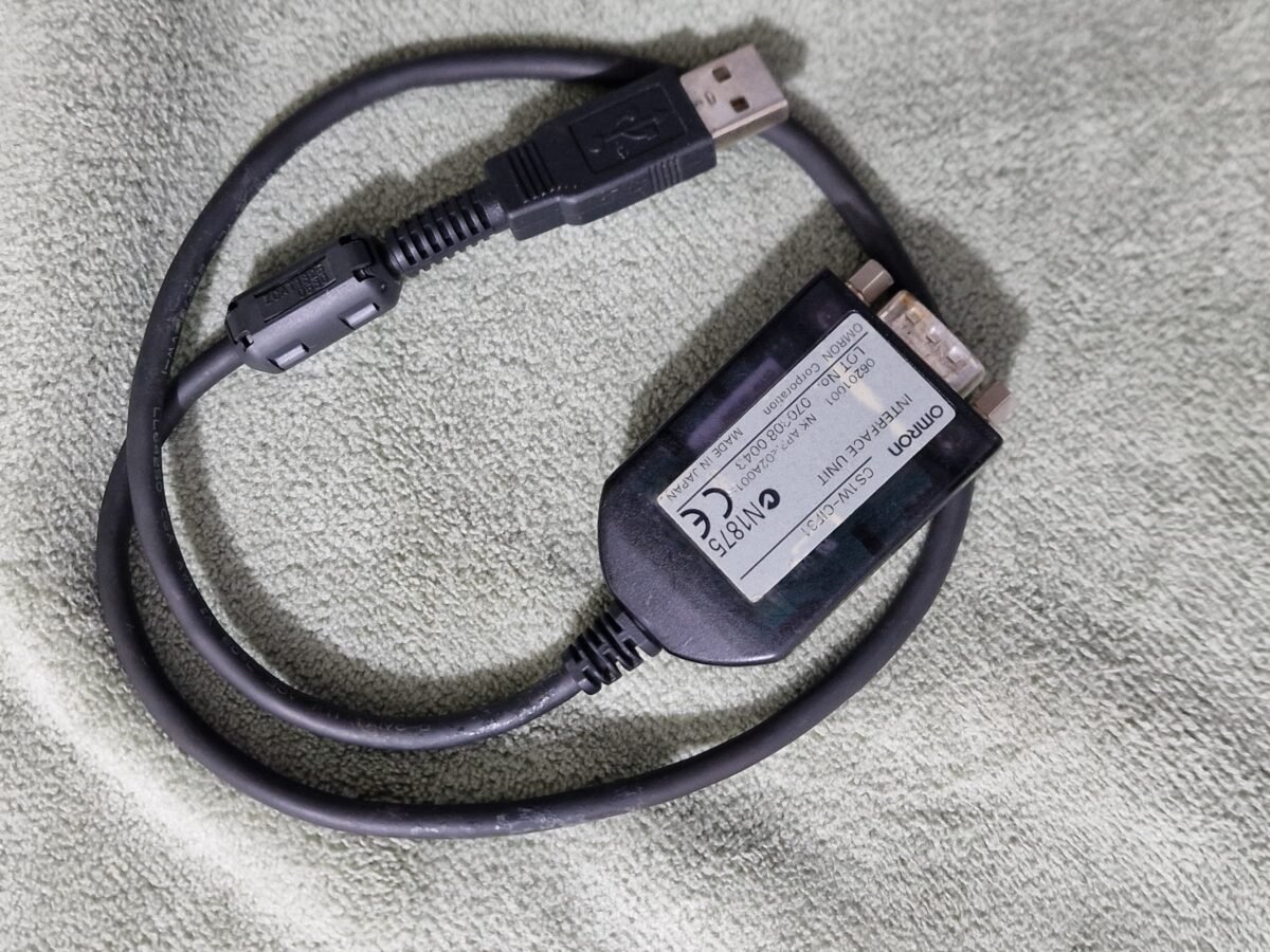 The CS1W-CIF31 USB-Serial Conversion Cable connects CS/CJ/CP Series, C Series, CVM1/CV Series of OMRON PLC (Programmable Controller) or PT (Programmable Terminal) to a personal computer's USB port. – Image 1